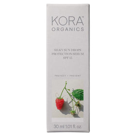 KORA Organics Silky Sun Drops bottle top close-up showing smooth finish