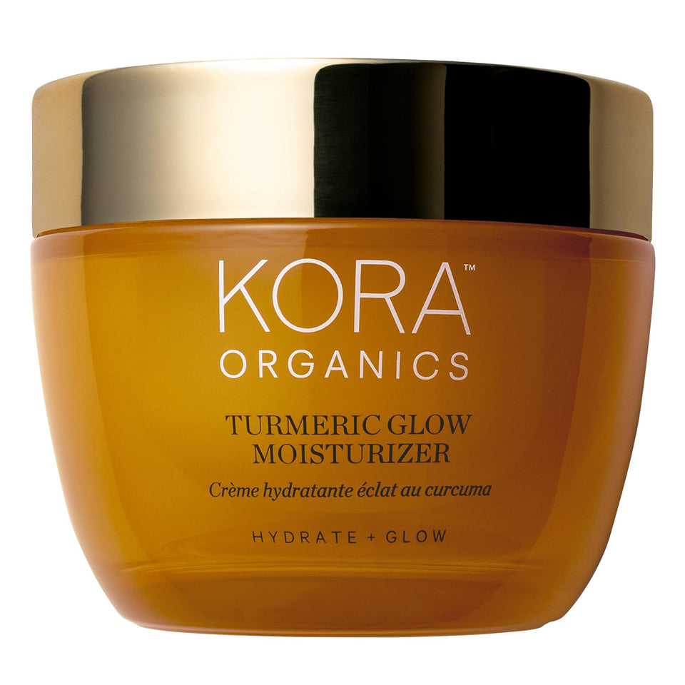 KORA Organics Turmeric Glow moisturizer bottle close-up for daily hydration