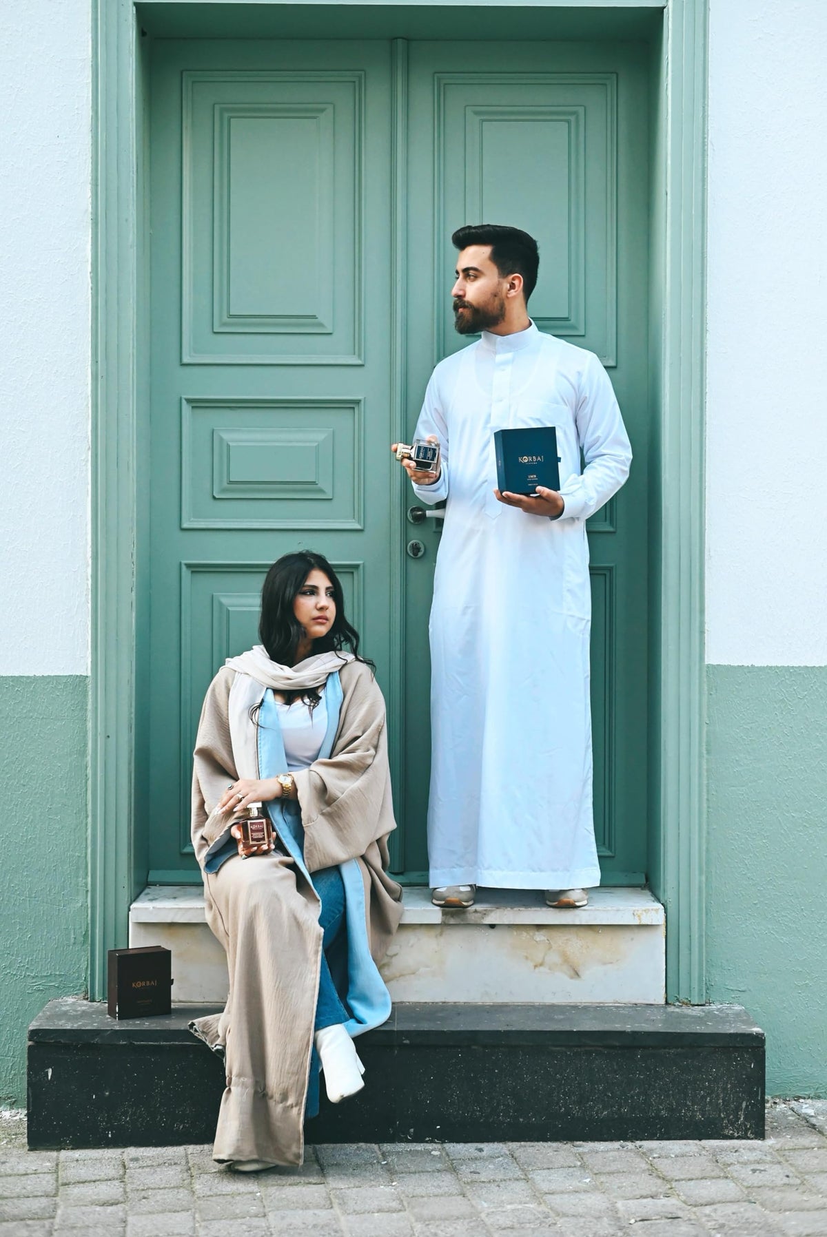 KORBAJ PARFUMS Emir blue bottle packaging adds modern sophistication.