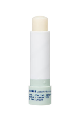 Korres Apricot Kernel Oil bottle highlighting nourishing emollients for the lips.