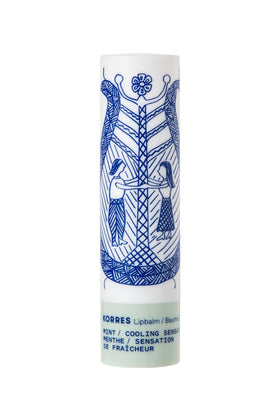KORRES Balsam Lip Butter Stick closeup showing smooth glide and clear shine.