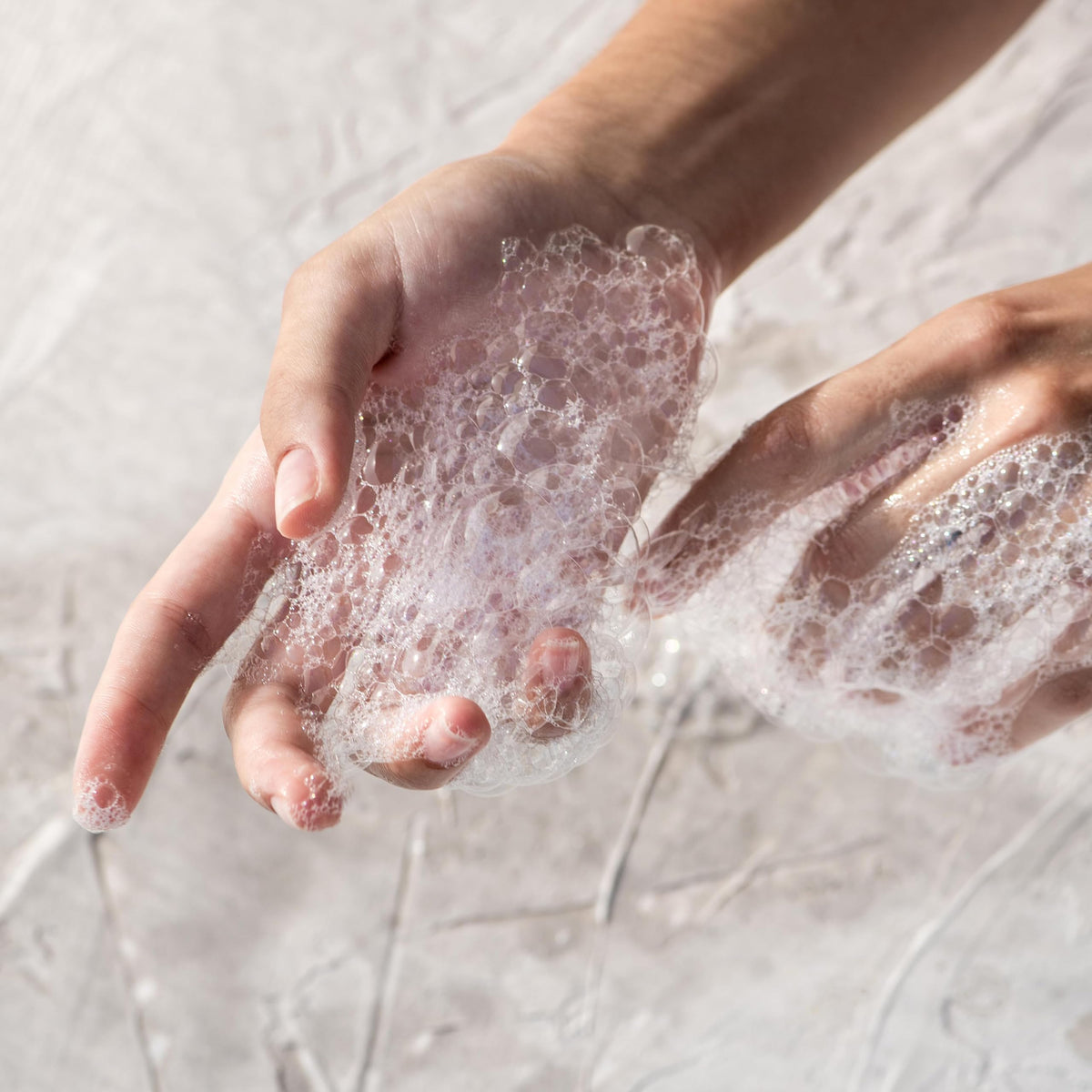 KORRES creamy foam texture shown for rich full-body lather.