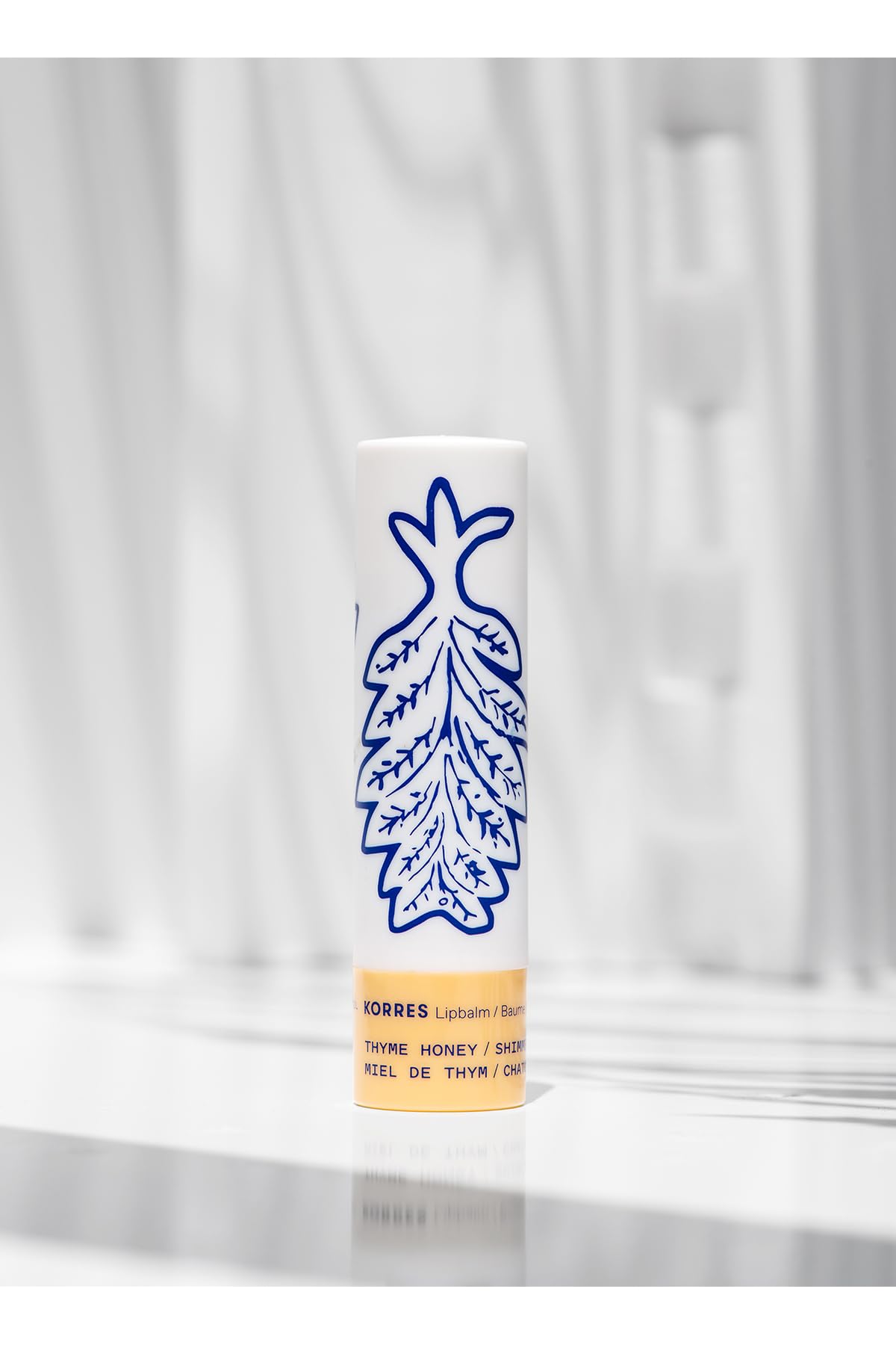 KORRES Lip Butter Stick nourishes lips with apricot, almond, jojoba, and crambe oils for smooth comfort.
