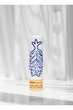 KORRES Lip Butter Stick nourishes lips with apricot, almond, jojoba, and crambe oils for smooth comfort.