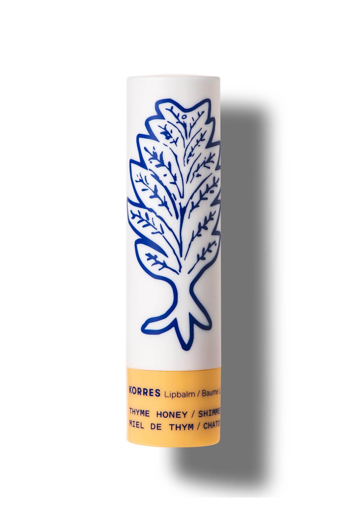 KORRES Lip Butter Stick Thyme Honey Shimmer provides a soft golden glow while keeping lips moisturized.