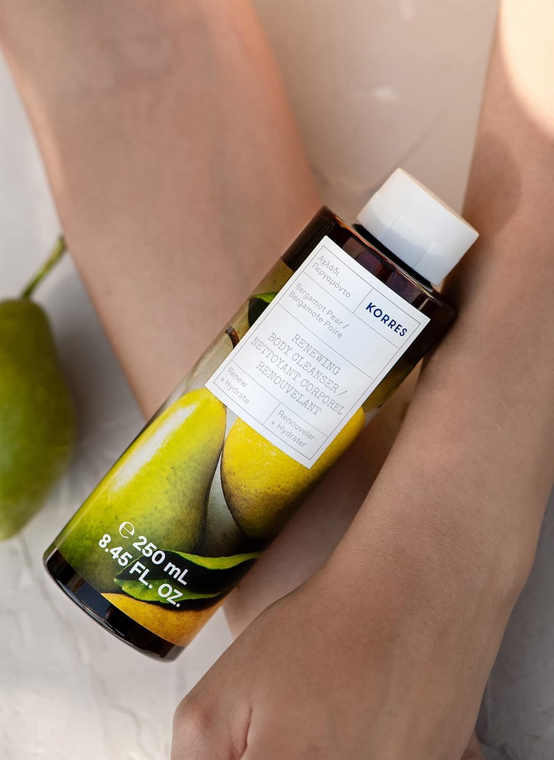 KORRES Bergamot Pear foam on bottle emphasizes gentle cleansing and hydration