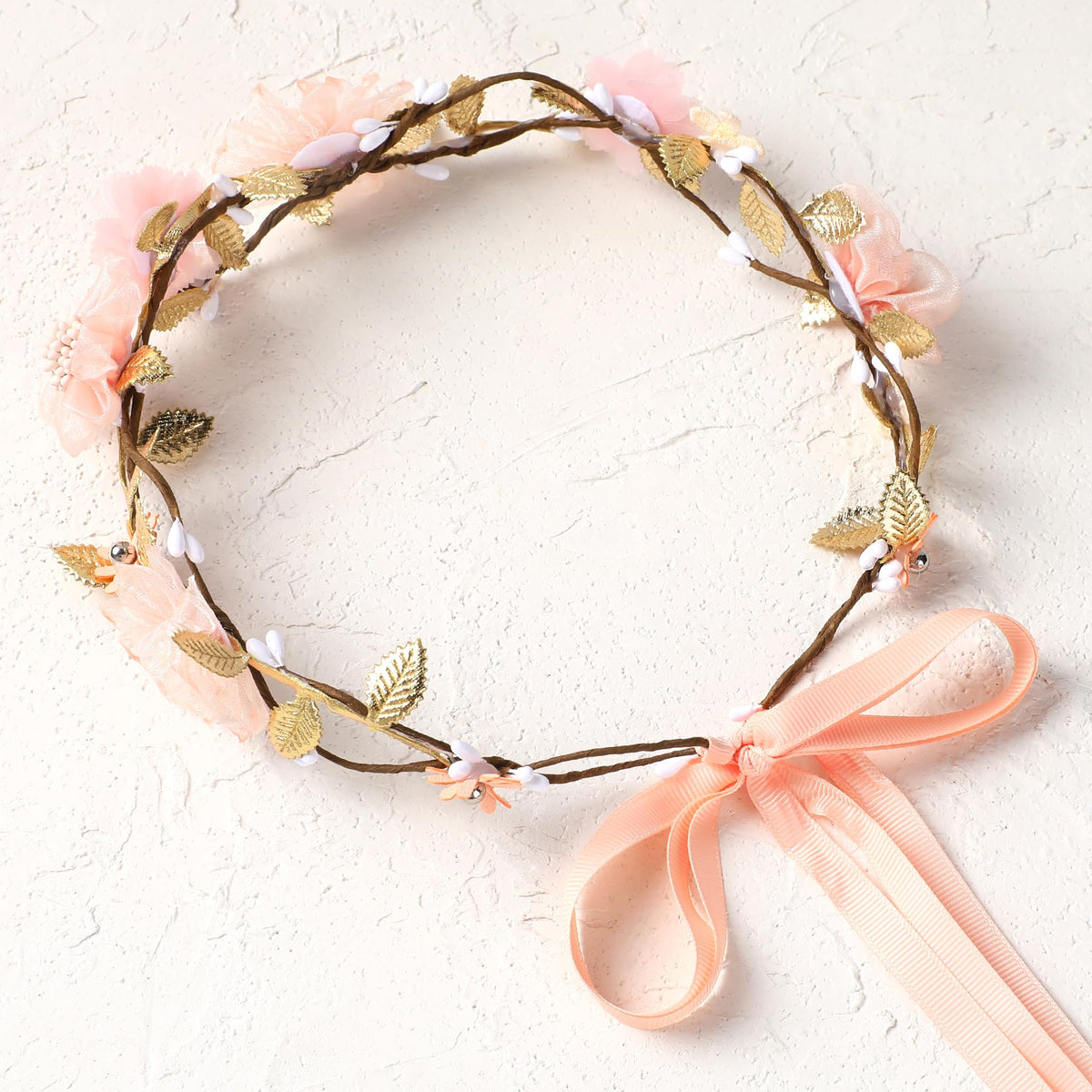 KorViSHOW Pink Flower Crown worn at a party or celebration.