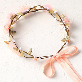 KorViSHOW Pink Flower Crown worn at a party or celebration.
