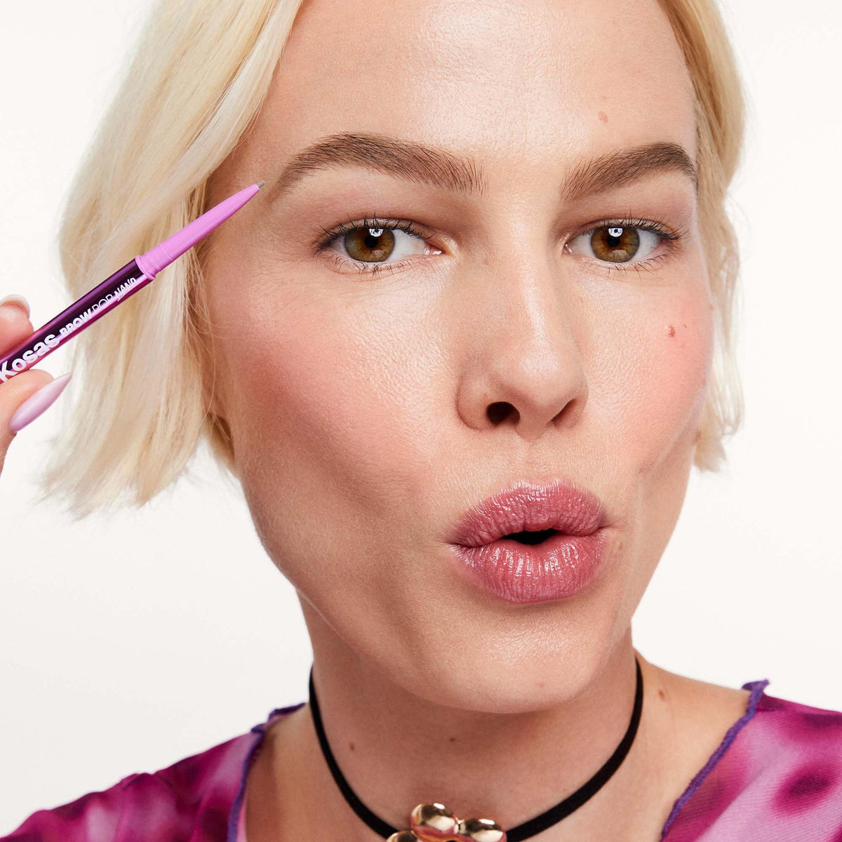 Kosas Brow Pop Nano eyebrow pencil delivers long-wear performance for daily use.