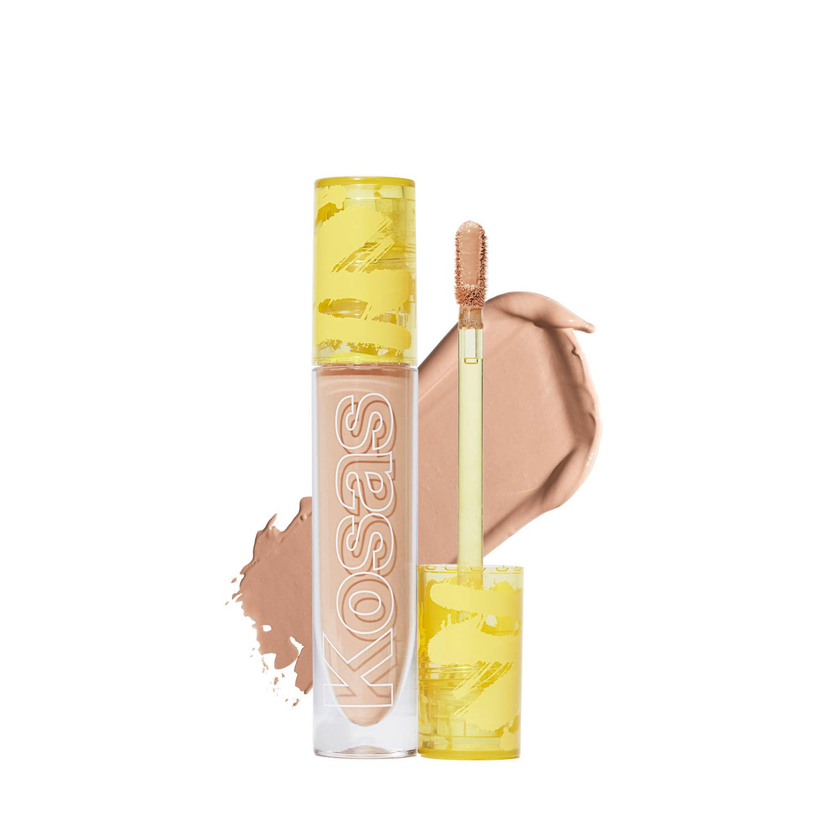 Kosas Revealer Concealer tube dispensing for smooth application and blend.
