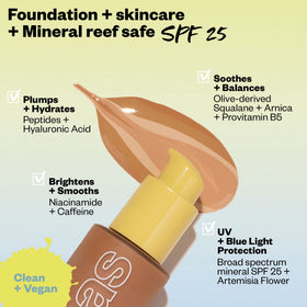 Applying Kosas Revealer with a brush for precise, seamless coverage.
