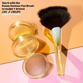 Kosas Sun Show Glowy Warmth bronzer applied with brush for precise, buildable color