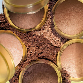 Kosas Sun Show Glowy Warmth application set shows versatile placement on face.