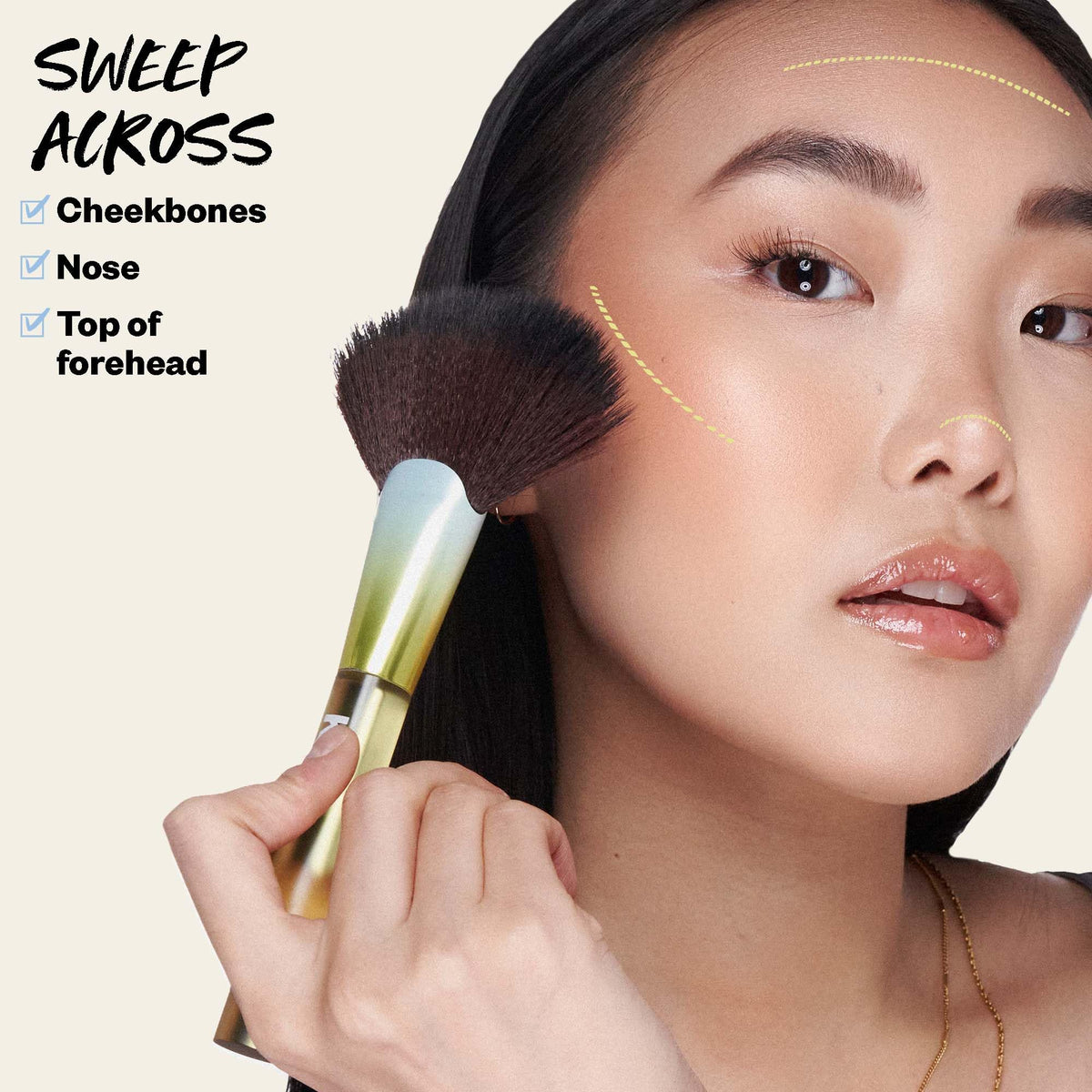 Kosas Sun Show Glowy Warmth Tropic on cheekbone demonstrates a seamless blend and subtle radiance.