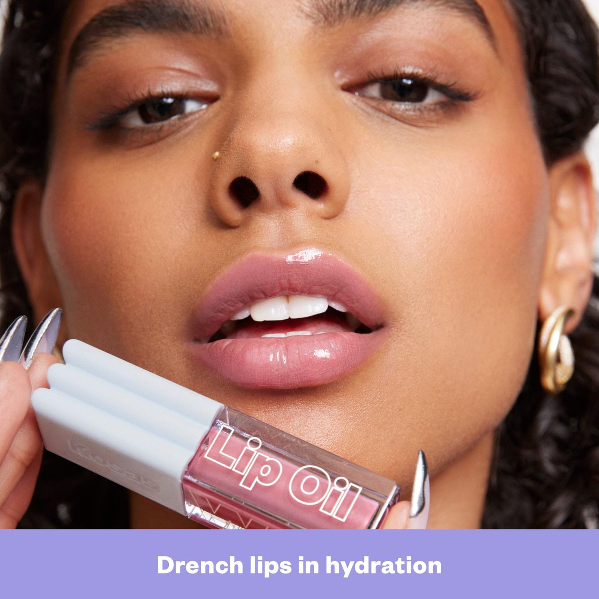 Hydration glow from Kosas Wet Lip Oil Gloss on lips
