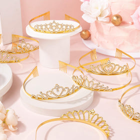 KQYSLXG sparkling rhinestones crown headband catching sunlight.