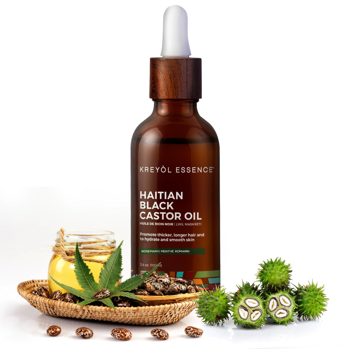 Pouring Kreyol Essence Haitian Black Castor Oil for scalp hydration and shine