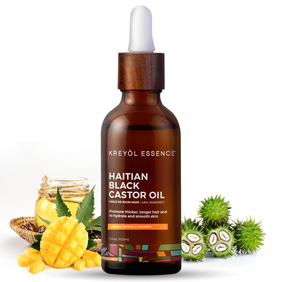 Kreyol Essence Haitian Black Castor Oil in a glass bottle for skin and hair nourishment.
