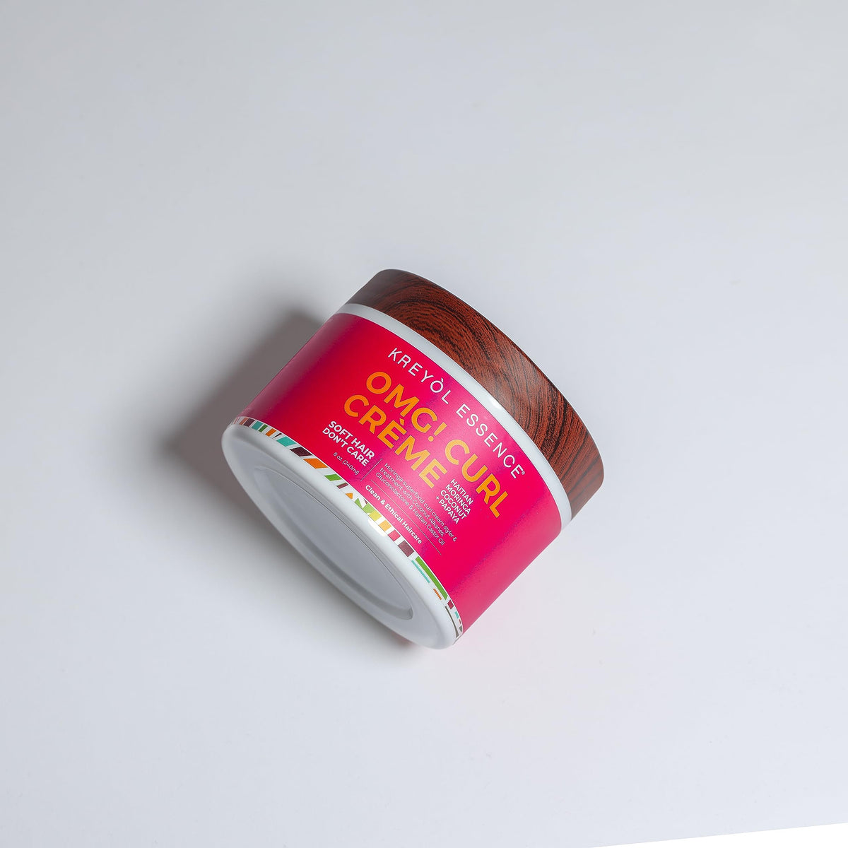 Close-up of Moringa Styling OMG Curl Creme reveals rich oils that add shine
