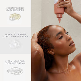 Kristin Ess Bouncy Curls Curl Cream close-up showing smooth texture and shine.