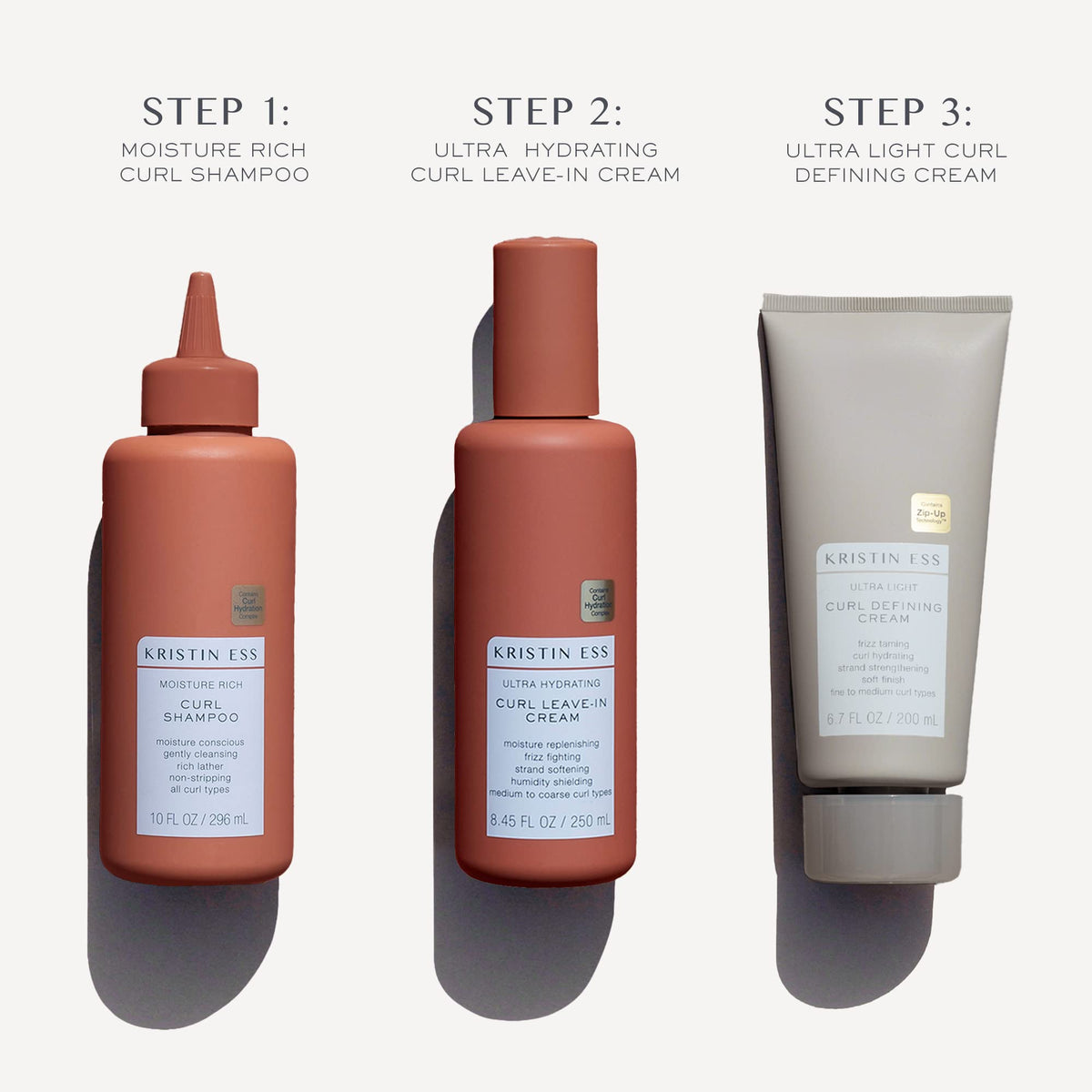 Kristin Ess Bouncy Curls Curl Cream tube adds definition with lightweight hold.