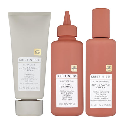 Kristin Ess Bouncy Curls Shampoo bottle for gentle cleansing and moisture support.