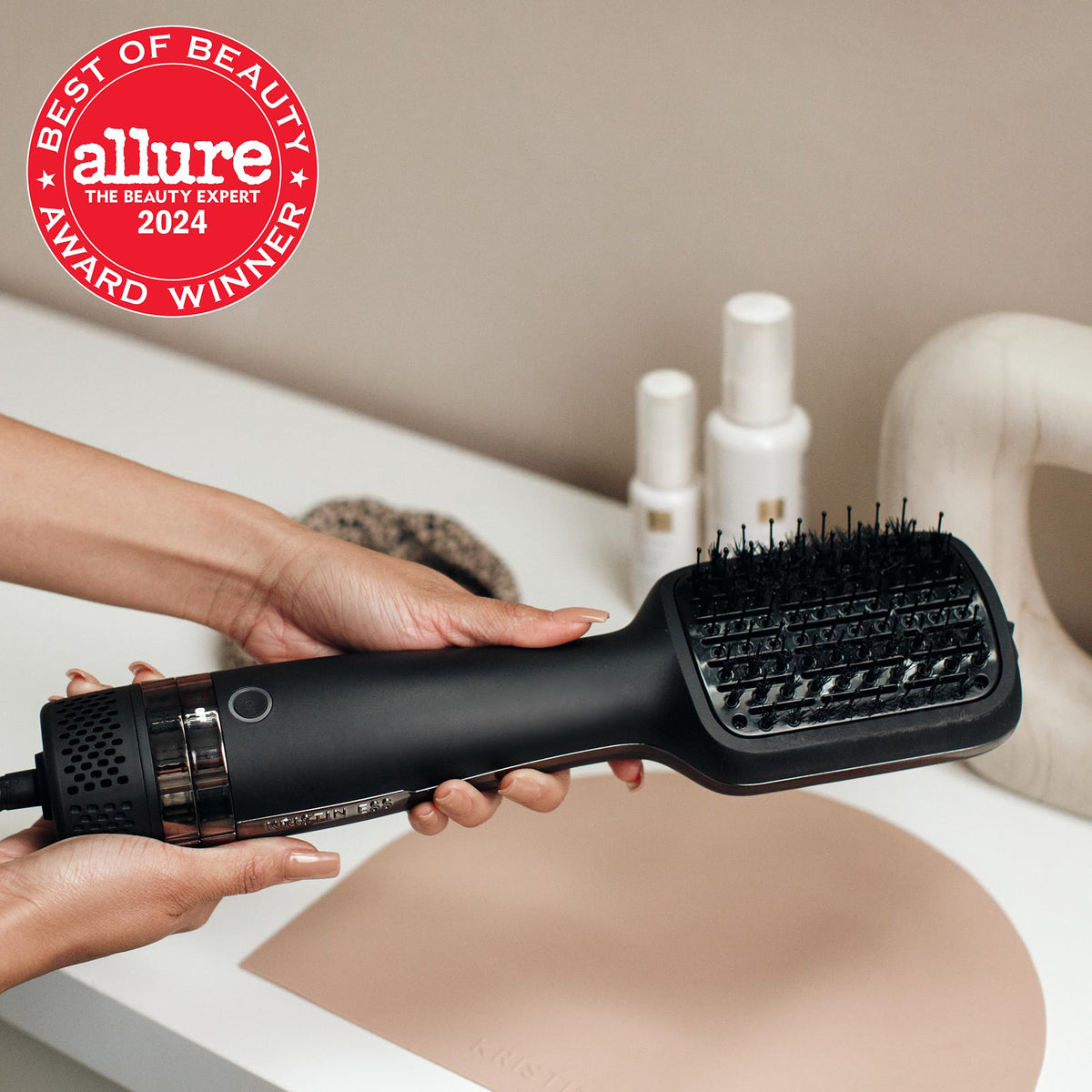 Kristin Ess Hair Volumizing Brush head close-up highlights ceramic and ionic bristles