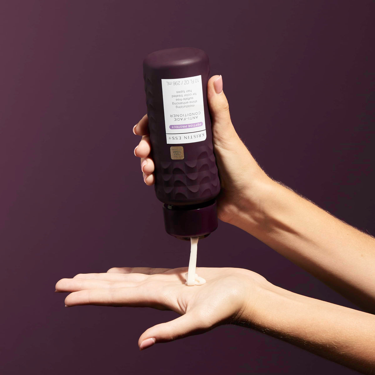 Kristin Ess+ hydrolyzed quinoa color boost graphic highlights color longevity.