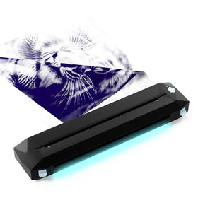 KVM tattoo transfer printer with LED strip for precise stencil transfers.