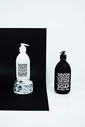 Elegant setup for kitchen and bathroom featuring Marseille soap bottle.