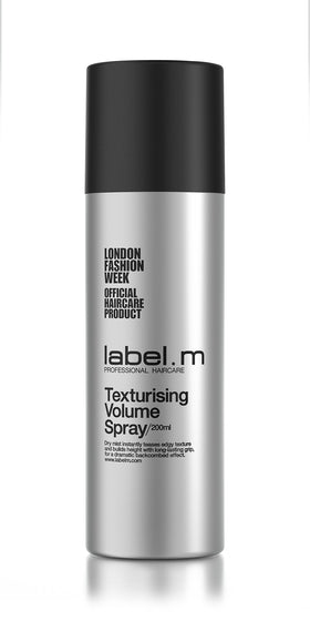Label.M Texturizing Volume Spray applied to roots for lift and texture.