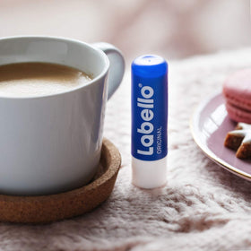 Labello Original Lip Balm on a dresser illustrating a simple daily lip care routine