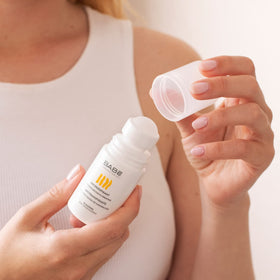 Close-up of the Laboratorios Babe roll-on applicator for gentle odour control.
