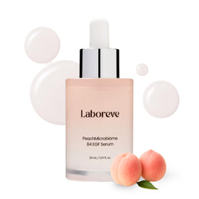 Laboreve PeachMicrobiome 84 EGF Serum bottle close-up highlighting luxurious texture and hydration.