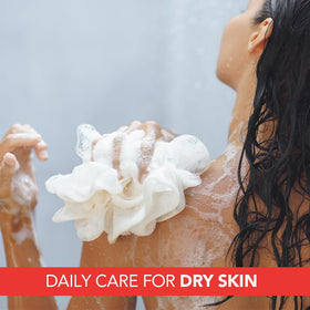 Lactovit Lactourea Body Wash texture close-up reveals creamy lather for dry skin.