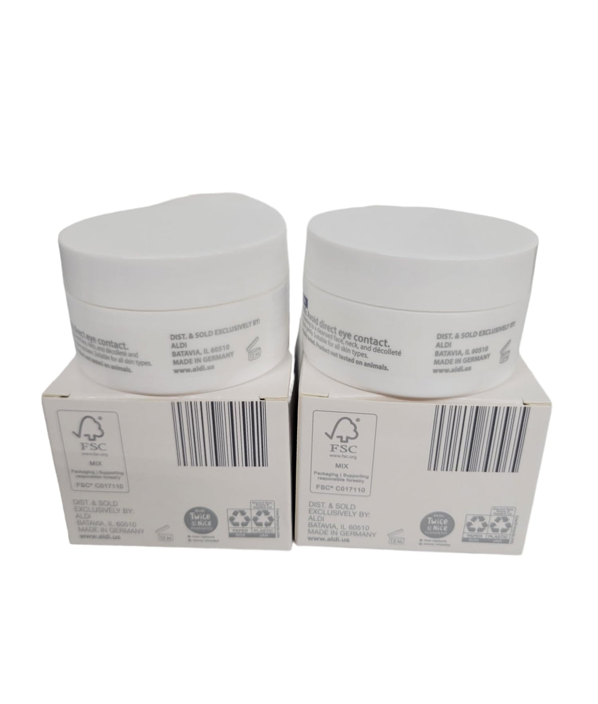 Lacura Q10 night cream jars close-up highlighting overnight hydration benefits.
