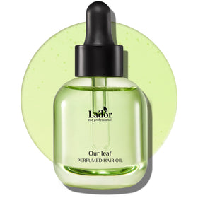 LA'DOR Hair Perfume Oil 04 Our Leaf bottle close-up showing frizz control and shine