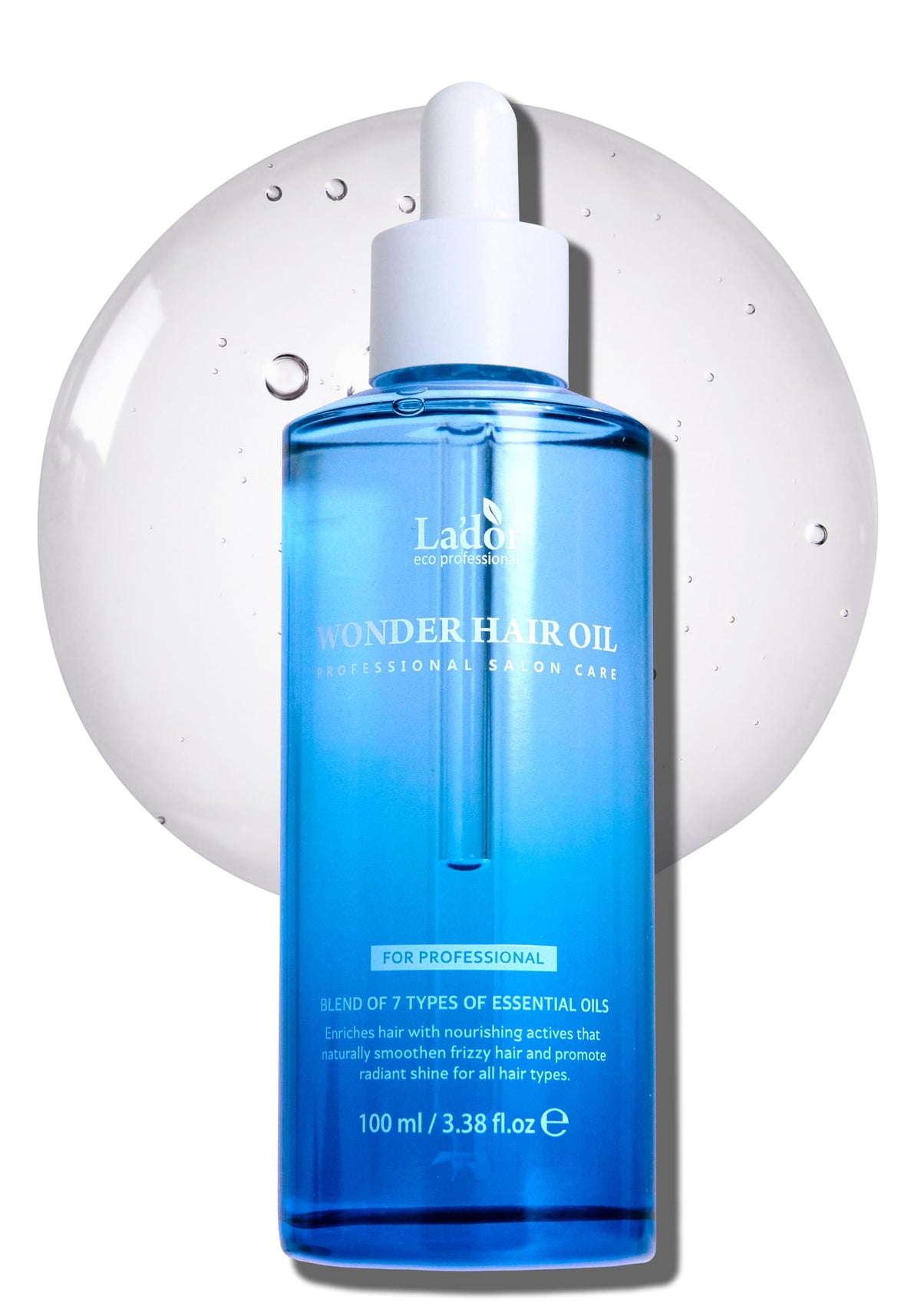 LA'DOR Wonder Hair Oil bottle pour demonstrates easy application and lightweight moisture.