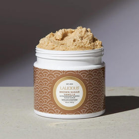 Close-up of brown sugar crystals with vanilla scent for radiant skin.