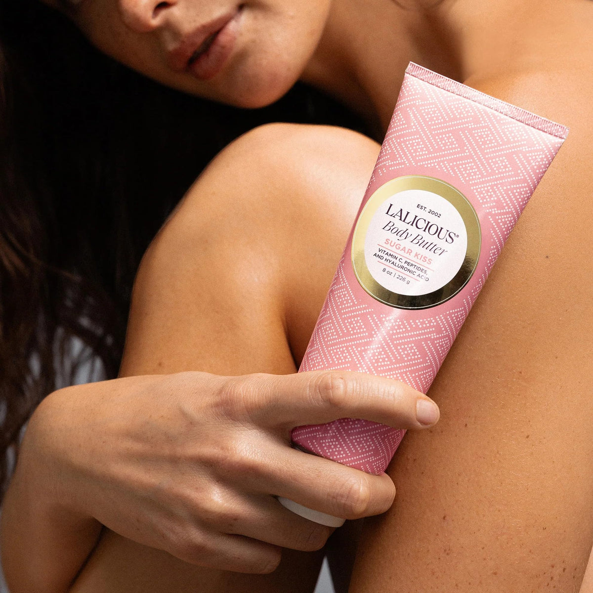 Close-up of Sugar Kiss whipped texture demonstrating quick absorption for soft skin