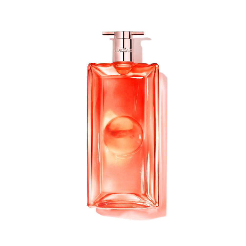 Lancôme Idôle Peach ‘N Roses bottle highlights fruity floral notes for daily elegance.