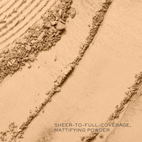 Lancôme Dual Finish swatch on skin demonstrates buildable coverage for a seamless look.