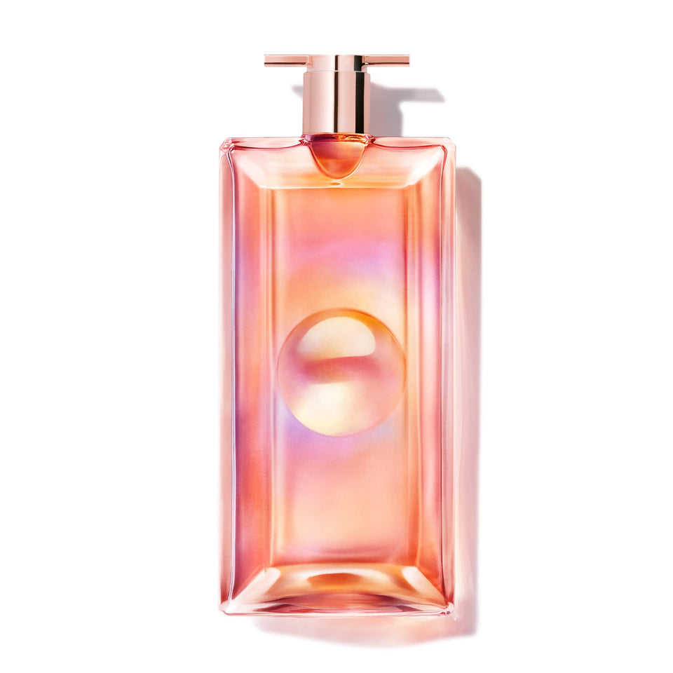Lancôme Idôle Nectar bottle in peach hue highlights bold floral notes.