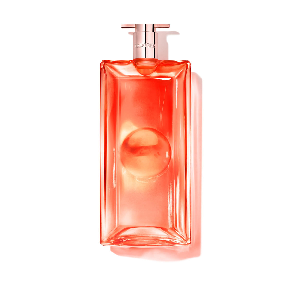 Lancôme Idôle peach bottle front view, highlighting a bright fruity floral vibe for daily wear