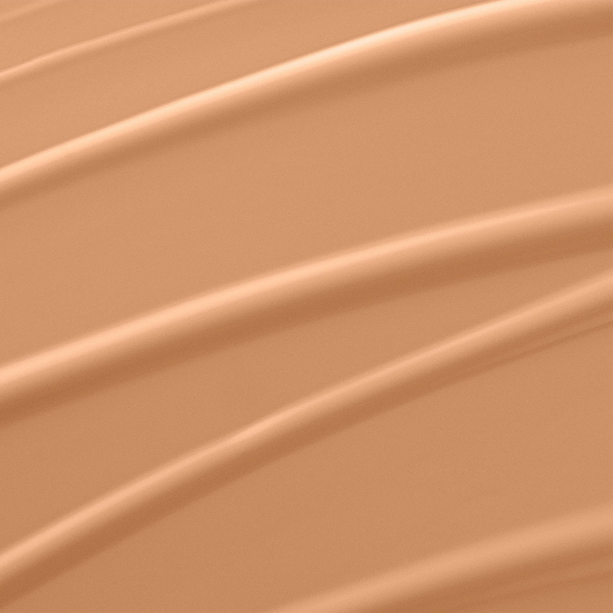 Texture swirl of Lancôme Renergie Lift Foundation 330 demonstrating lightweight coverage.