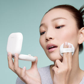 Laneige Glaze Craze Peach Glaze Lip Serum on lips for glossy hydration.