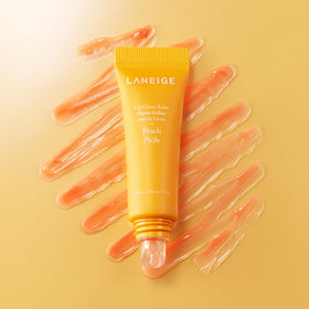 LANEIGE Lip Glowy Balm Peach application offers smooth glide for daily moisture.