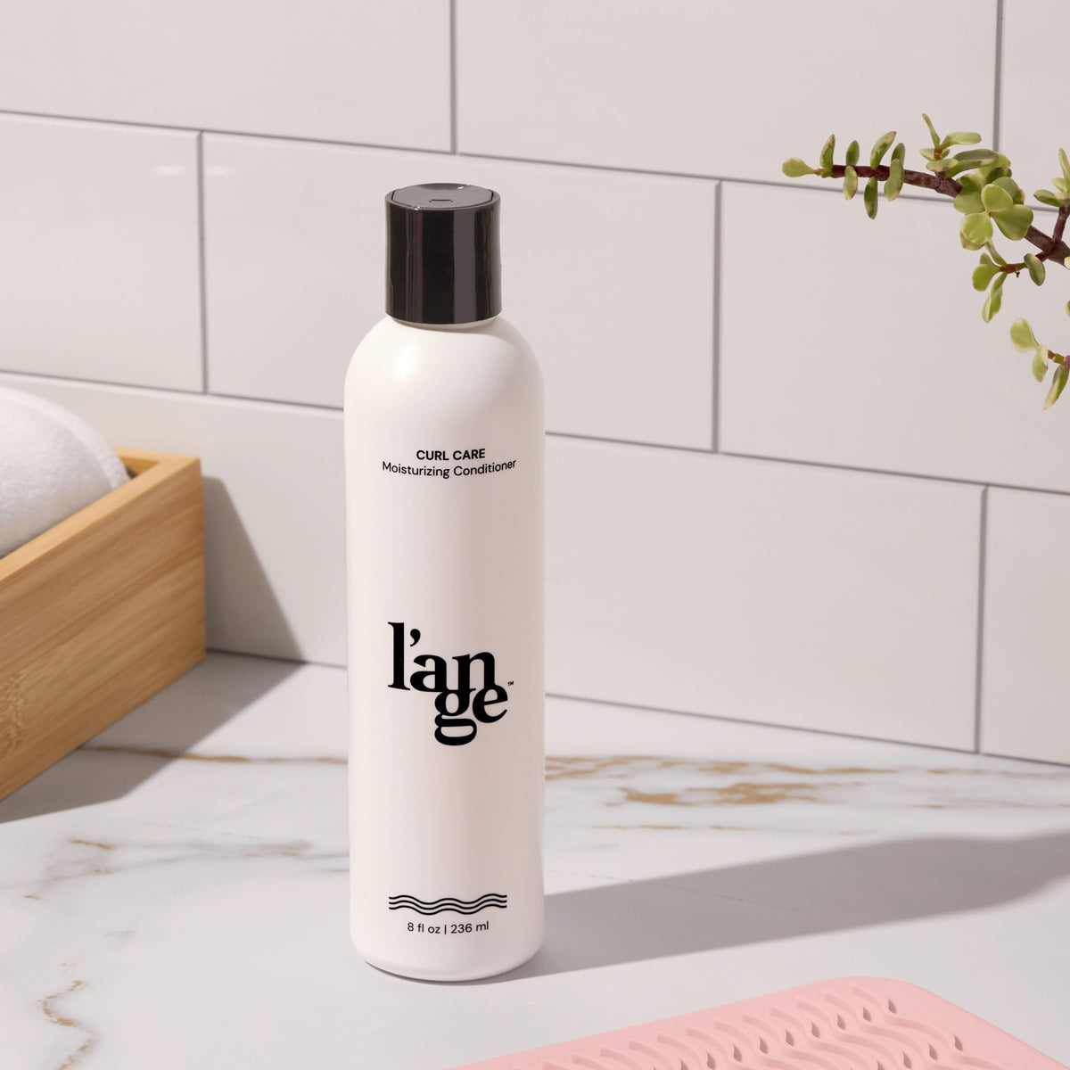 L'ANGE HAIR Curl Care Enhancing Conditioner showing frizz control and shine.