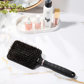 L'ANGE HAIR Detangling Paddle Brush used on thick hair for faster detangling