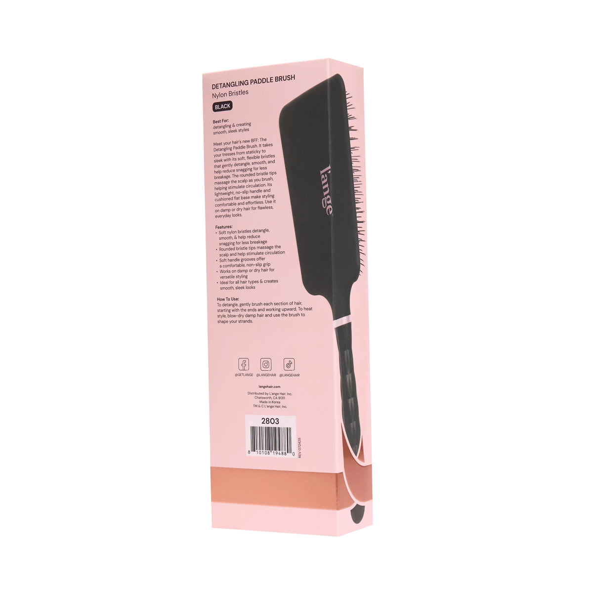 L'ANGE HAIR Detangling Paddle Brush gliding through wet hair for painless detangling.